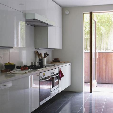 Granite is one of nature's hardest substances. Glossy white kitchen | Modern kitchens | White worktop ...