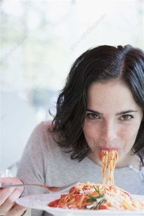 Woman Eating Spaghetti Stock Image F Science Photo Library