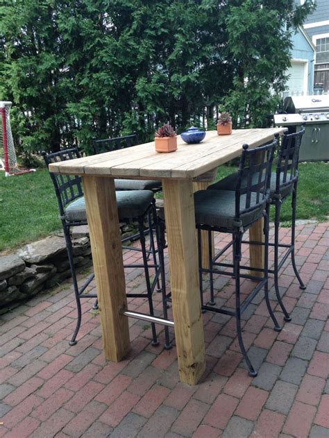 Set Up An Outdoor Bar Table Where You Can Relax In Comfort
