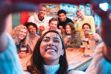 Multiracial Happy Friends Group Taking Selfie And Having Drunk Fun
