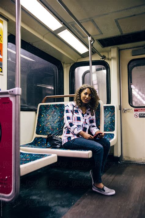 adult woman riding the subway by stocksy contributor jayme burrows stocksy