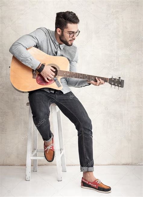 Handsome Man Playing Guitar — Stock Photo © Matusciac 54790219