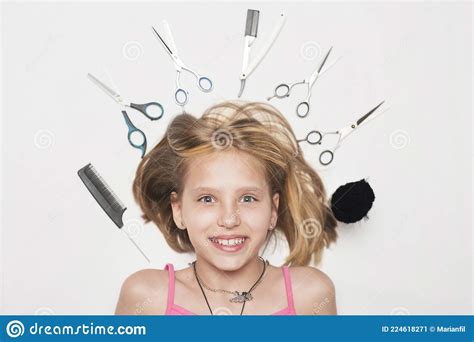 The Girl Lays On A White Background Among Professional Tools For