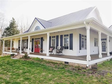 Charming Farmhouse With A Wrap Around Porch