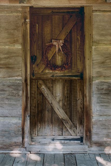 An abundance of windows and a kitchen sky light make this a bright log cabin while capturing great. old doors | Flickr - Photo Sharing!