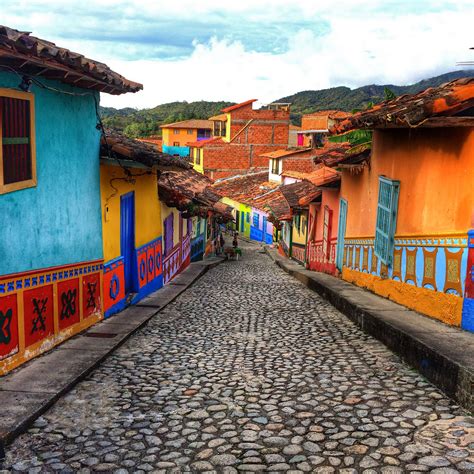 Colombia Travel At Its Finest The Beautiful Town Of Guatape In