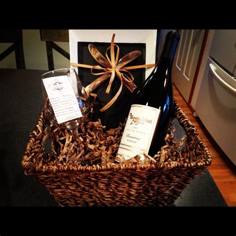 Maybe you would like to learn more about one of these? Wine gift basket-diaper raffle prize idea | Baby Shower ...