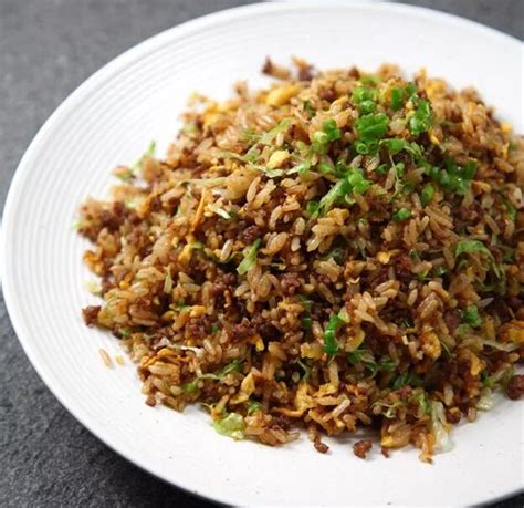 Instructions in a medium pot heat up oil and toast the rice with the garlic and salt until the rice changes color to a bright white golden tone. How To Make Beef Fried Rice - Step By Step - Yum Of China