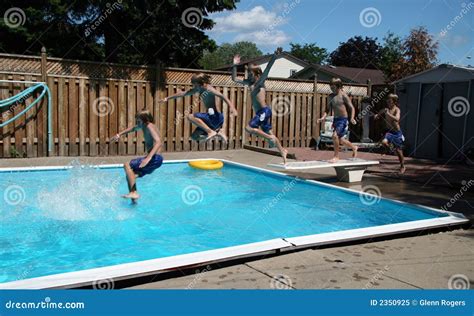 Boys Jumping Into Pool Stock Image Image Of Boys Summer 2350925