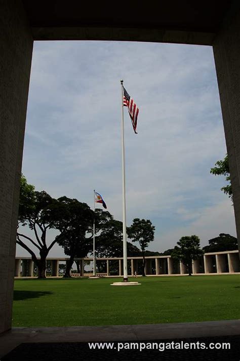 The Philippine And American Flag Rise On The Memorial Plaza With West