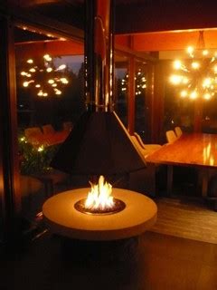 Maybe you would like to learn more about one of these? Outdoor Fire Pit with a Suspended Hood
