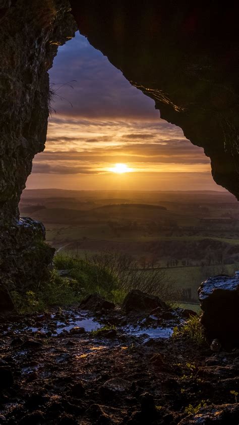 Download Wallpaper 1350x2400 Cave Sun Sunset Landscape Nature