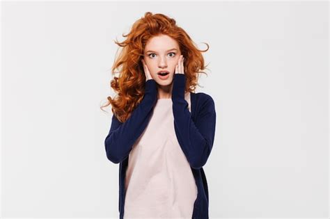 Free Photo Shocked Young Redhead Lady Standing Isolated