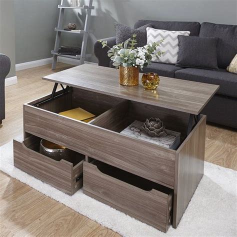 The table features a smooth, rectangular table top, with three open storage this coffee table features a marble table top, making it the perfect piece for your living room. Marcello Storage Coffee Table In Walnut With Lift Up Top ...