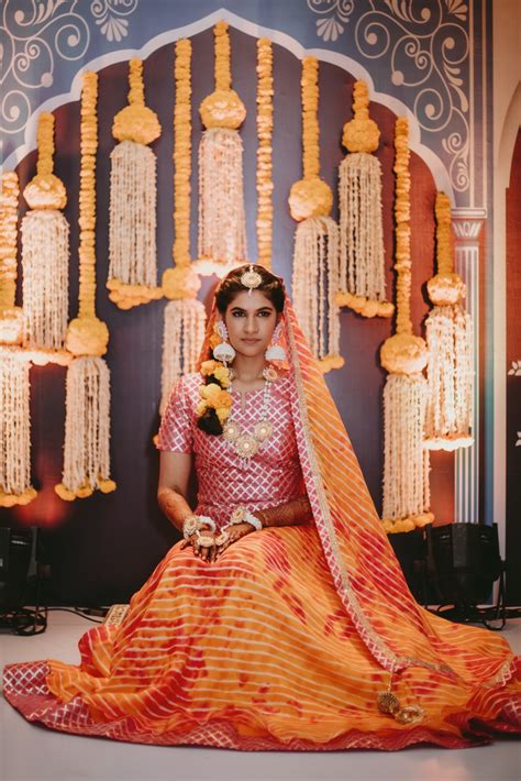 The bride and groom wear yellow clothing in their. A Grand Muslim Wedding in Mumbai with Fun & Colorful ...