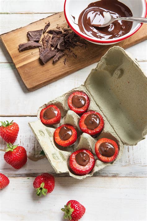 Use Egg Cartons As Serving Platters For Chocolate Stuffed Strawberries