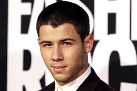Nick Jonas Poses In Shirtless Spread For Flaunt Magazine