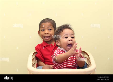 Two Brothers Of Mixed Race Focus In The Front Baby Stock Photo Alamy