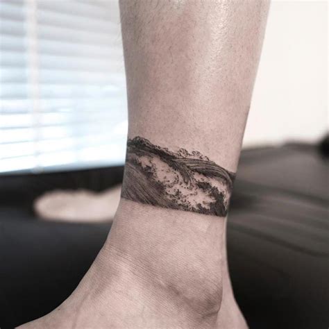 Waves by Hongdam | Ankle band tattoo, Ankle tattoos, Tattoos