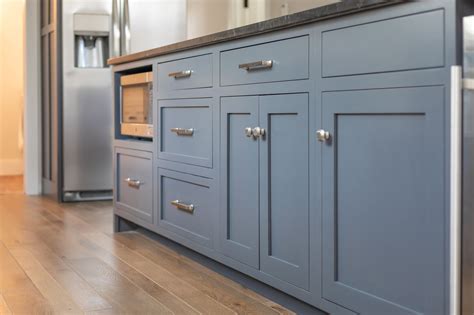 Manufacturer and retailer of specialty tools. Slate blue farmhouse kitchen with shaker style cabinets ...