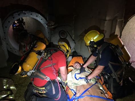 Firefighters Train To Keep Their Cool In Confined Spaces