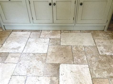 Floor tiles remain a popular option for kitchens because they come in a wide range of colors and materials, making it easy to match the floor with the surrounding walls and cabinets, and offer durability and water resistance. Travertine Tile - Bay Tile Kitchen & Bath Clearwater, FL