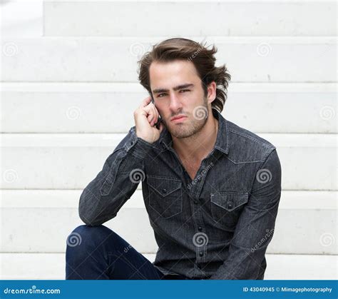 Cool Guy Sitting Outside With Mobile Phone Stock Image Image Of Face