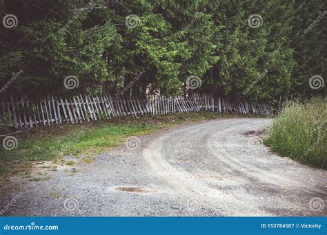 Countryside Road And Rustic Wooden Fence Tara National Park Stock