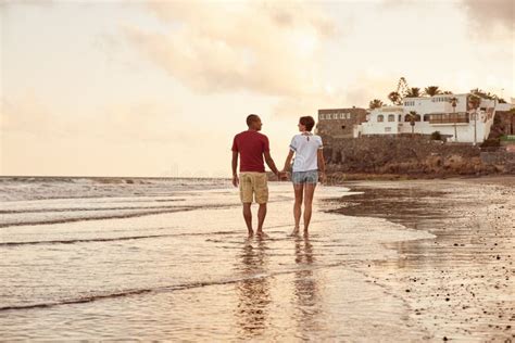 Relaxed Couple Strolling On The Beach Stock Photo Image Of Caucasian