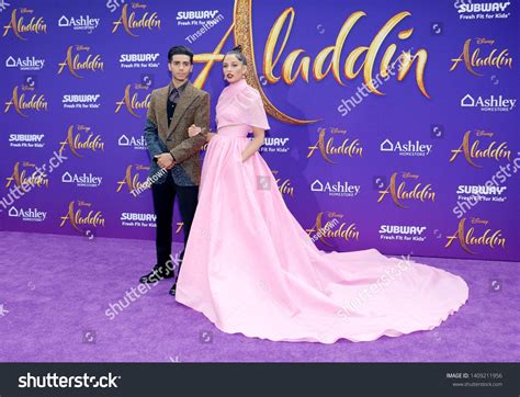 Mena Massoud And Naomi Scott At The Los Angeles Premiere Of Aladdin Held At The El Capitan