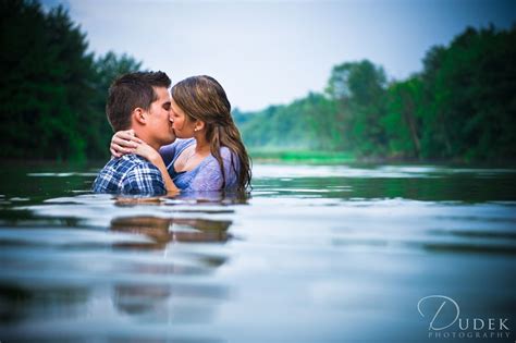 Engagement Session Couple Kissing In Water Tattooed Couples