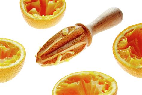 Orange Halves And Wooden Juicer Photograph By Kevin Curtisscience