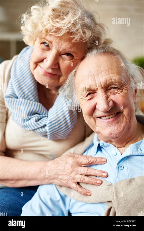 Affectionate Seniors Looking At Camera With Smiles Stock Photo Alamy