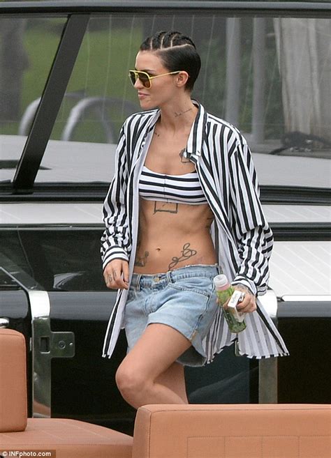 Ruby Rose Shows Off Her Washboard Abs In A Bikini Top And Denim Shorts