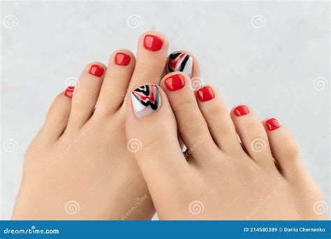 Womans Feet And Hands On Gray Background Beautiful Summer Red Nail