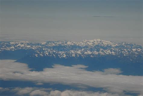 Aerials View Of The Snow Covered Rocky Mountains From 30000 Feet