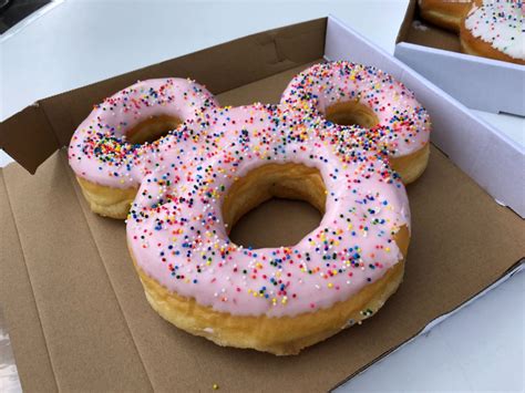 review mickey celebration donut at the lunching pad in the magic kingdom wdw news today