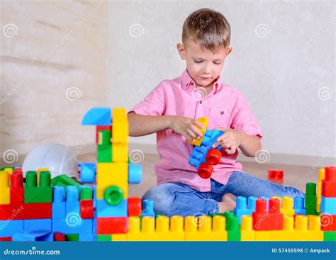 Young Boy Playing With Colorful Building Blocks Stock Photo Image Of