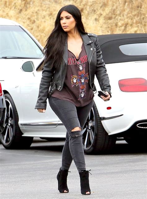 Pregnant Kim Kardashian Covers Her Baby Bump In A Rocker Tee Photos