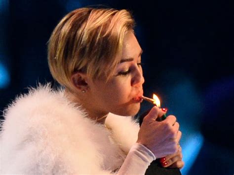 Miley Cyrus Surprises Fans In Bizarre Pot Smoking Performance In Miami CBC News