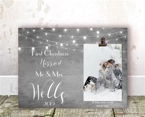 Shop from existing designs or create your own personalized gifts! First Christmas Married Picture Frame Personalized ...