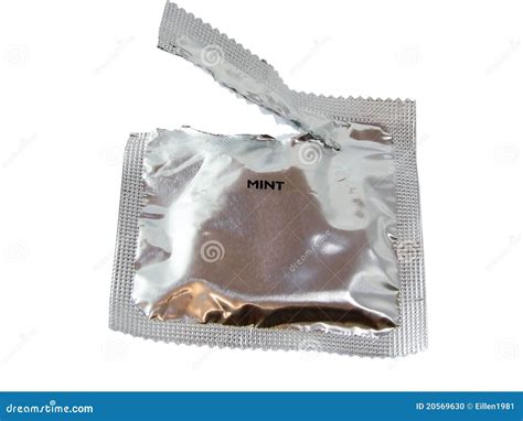 Open Pack Of Condom Isolated On White Stock Photo Image