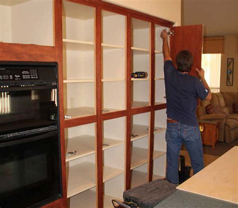 The kitchen will soon be transformed into a worksite and the old cabinets discarded! What Cabinet Refacing Really Looks Like | Cabinet refacing ...