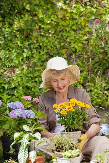 Premium Photo Retired Woman Working In The Garden In 2023 Healthy