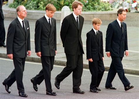 story behind prince philip walking with harry william at princess diana s funeral