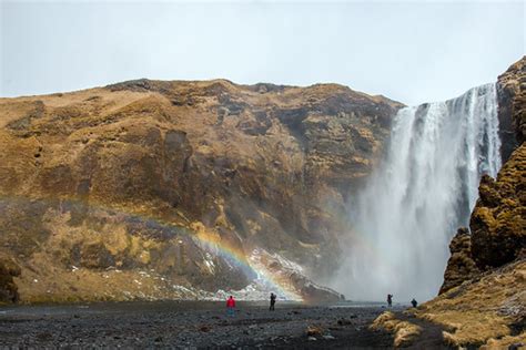 Skogafoss With The Rainbow Skogafoss Waterfall In Iceland Flickr