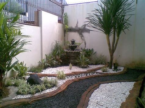 desain taman kering rumah bu robby di pelita monginsidi | tanaman hias