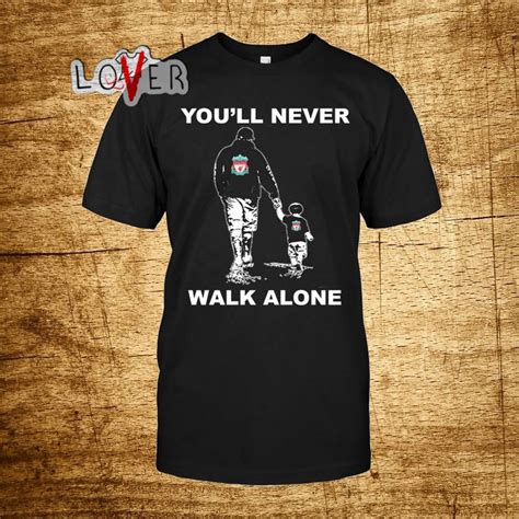 When you walk through the storm hold your head up high and don ' t be afraid of the dark. You'll never walk alone shirt, hoodie, sweater and V-neck ...
