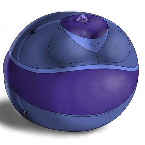 A Purple And Blue Ball Sitting On Top Of A White Floor