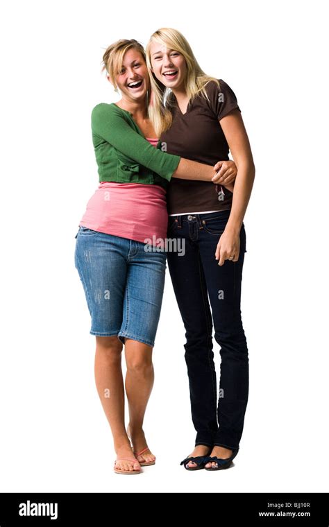Two Teenage Girls Laughing And Embracing Stock Photo Alamy
